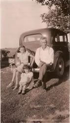 Bill Westphal, section crew manager, with daughters June and Gladys, circa 1940s
